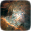 Images with swirls of pastels and light brown near the forefront, taken of the Orion Nebula with a very large infrared telescope.